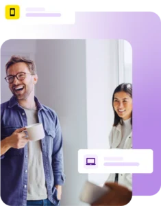 Two people smiling during conversation