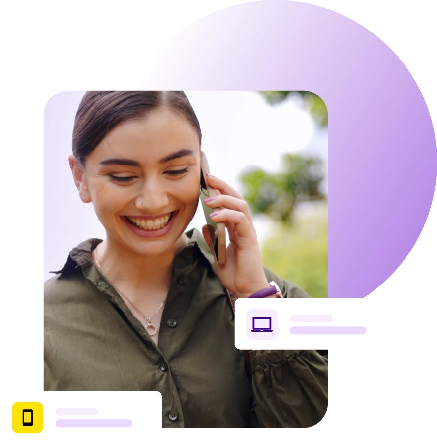 Lady walking outdoors on a call with a mobile phone smiling