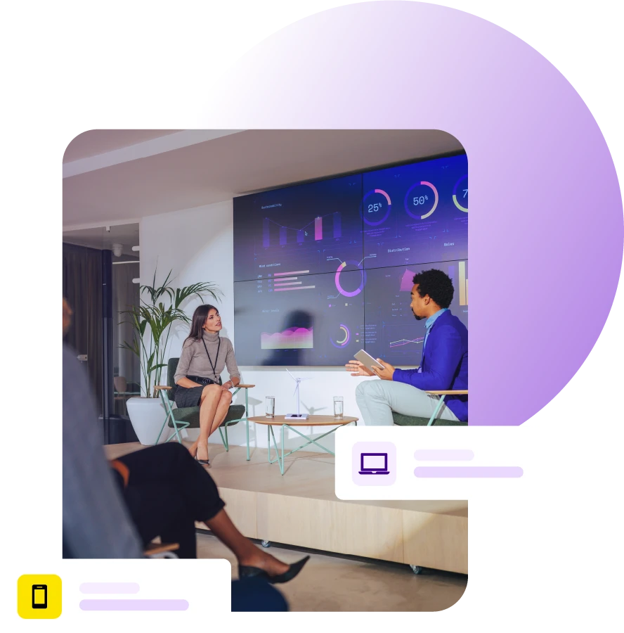 Conference stage interview between man and lady