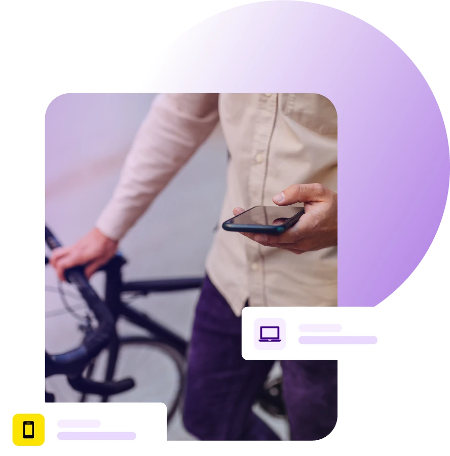 Cyclist looking at mobile phone