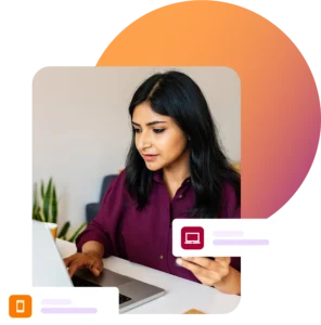 Lady looking at laptop while on phone