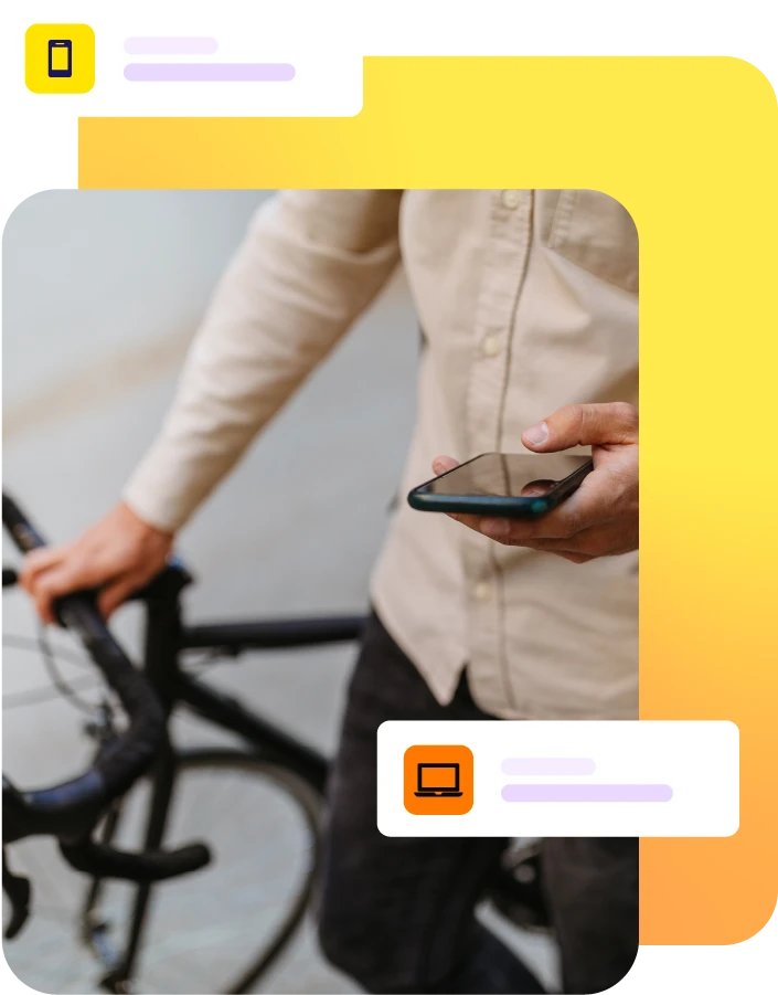 Cyclist looking at mobile phone