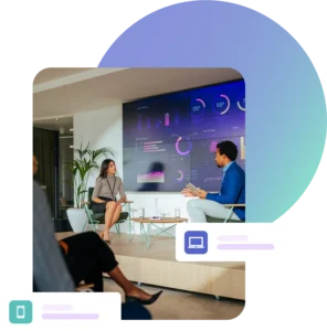 Conference stage interview between man and lady