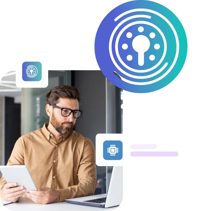 Man on a laptop and tablet device