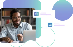 Man wearing a headset on a laptop