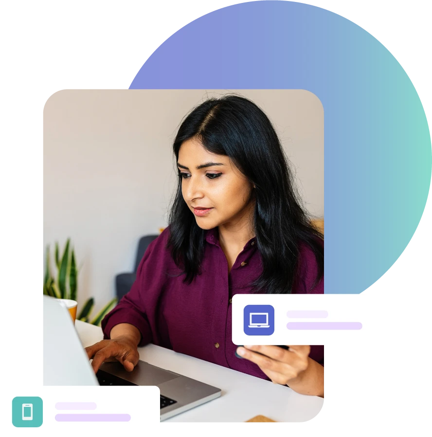 Lady looking at laptop while on phone