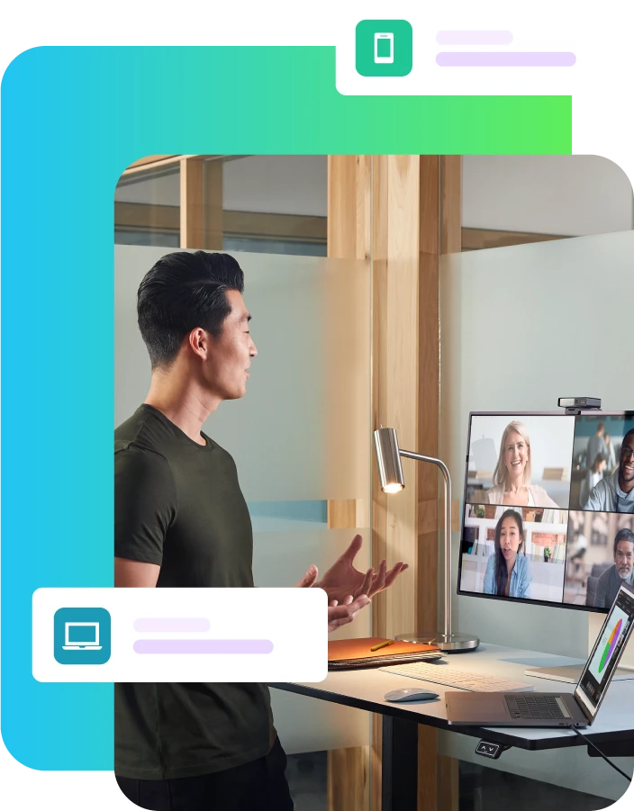 Man stood at desk on video call
